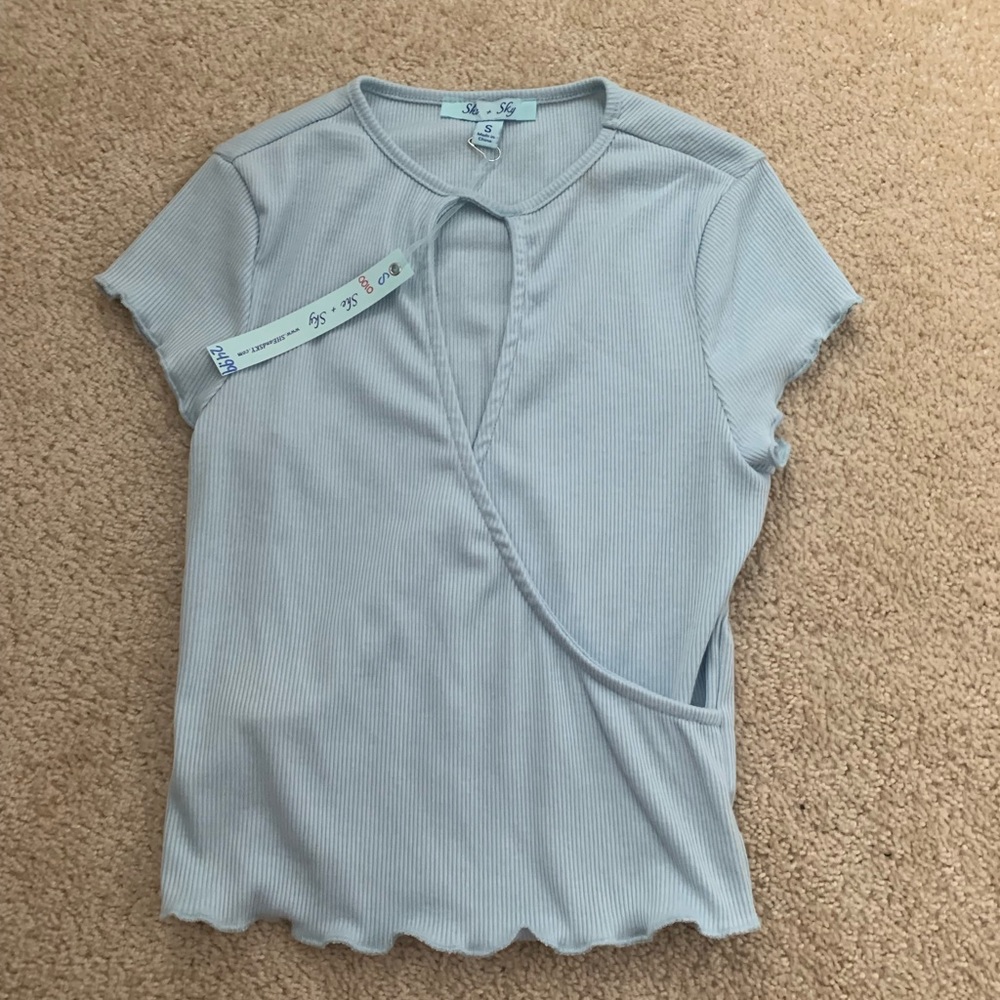 blue cut open shirt